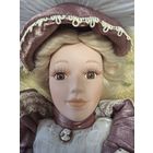 Кукла фарфоровая