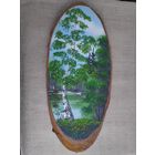 Панно на срезе дерева.