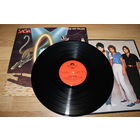 Saga - Heads Or Tales