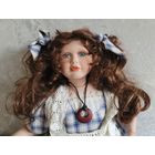 Коллекционная фарфоровая кукла