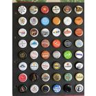 48 пивных крышек на планшете, все б.у. в разном состоянии