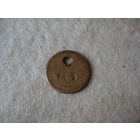 Номерной жетон.