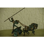 Статуэтка латунная  ( высота 14 см , длинна 17 см )