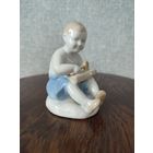 Статуэтка, фигурка фарфоровая Мальчик плотник.