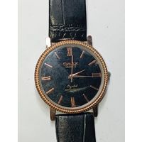 Кварцевые часы OMAX .