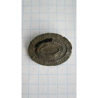 Накладка на офицерскую какарду РИА. Бронза, остатки эмали.