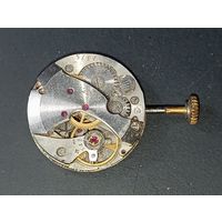 Часовой механизм  Заря номер 2009 ,  с позолоченной завидной головкой ..