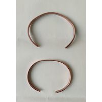 Два медных браслета,  Браслет Sabona сделано в США , и браслет с рисунком