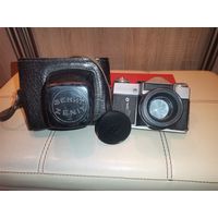 Фотоаппарат Зенит Е с объективом Гелиос 44-2, все выдержки рабочие.