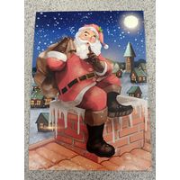 Открытка Дед Мороз с мешком на трубе камина чистая