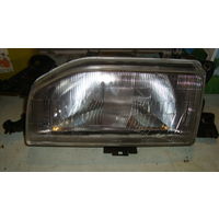 Фара передняя левая Мазда 323 1989 год б/у