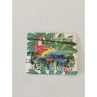 Марка из серии "Исчезающие виды" -Красный ара (Ara macao)