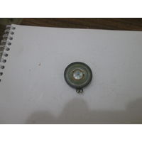 Телефонный капсюль или звонок мобильника.