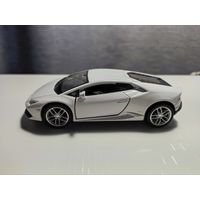 Модель автомобиля Lamborghini Huracan Welly машинка игрушка ламборджини