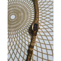 Часы наручные Беларусь 50 с браслетом,тикают.  В коллекцию,ремонт,на запчасти.Состояние на скане.