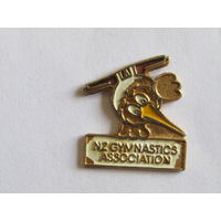Значок. Знак. "Ново Зеландская ассоциация гимнастики". "Новая Зеландия". "Спорт". "Гимнастика". м