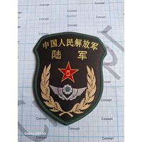 Шеврон КНР