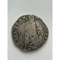 Серебряная европейская монета львиный талер XVII