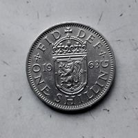 1 шиллинг 1963 года Великобритания. Королева Елизавета 2. Шотландский шиллинг-атакующий лев внутри коронованного щита.
