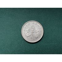 5 пенсов Великобритания.