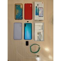 Телефон Redmi 9A и браслет Redmi Band 2.