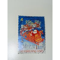 Финляндия 1990 марка с изображением Санта-Клауса на санях