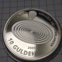 Нидерланды  10 серебрянных гульденов 2000 года .Последний выпуск .Миллениум.