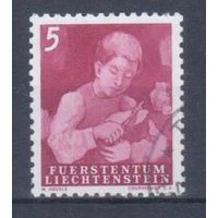 [1258] Лихтенштейн 1951. Сельская жизнь.Мальчик с хлебом. Гашеная марка.