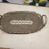 Поднос .Фруктовница Хлебница Сухарница. Мельхиор.	 Мельхиоровая сухарница, времён СССР, скань, размер с ручками 36*16.5 см.