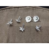 Эмблемы и звёздочки МВД СССР.