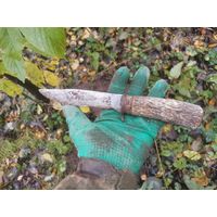 Нож охотничий.