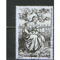 Марка из серии 1993г. Гайана "Рождество.Альбрехт Дюрер "Мадонна, коронуемая двумя ангелами"