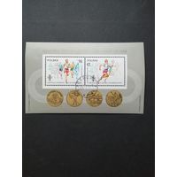 Польша 1984 Блок Mi.94 с двумя марками "Олимпийские игры в Лос-Анжелес и Сараево" (гашение с клеем) Mi.2916С-2917С каталог 2.50 евро