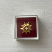 Эмблема Switzerland Tourism