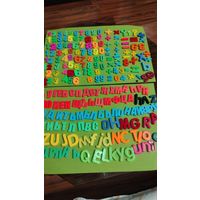 Азбука из цифр и букв на магнитах.