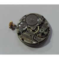Механизм от наручных часов "DOXA" 30-40-е годы Швейцария. Диаметр 2.4 см. Не исправный. Маятник целый.