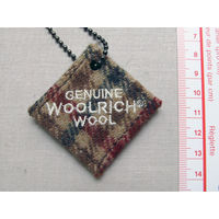 Брелок Timberland Woolrich 2000–2010-е