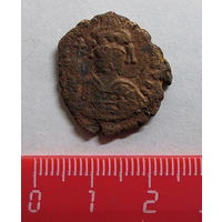 Фоллиса 1/2 (ХХ). Византия. Тиберий II Константин (годы правления: 578 г. - 582 г.), чеканка: 580 г. - 581 г. Встречаются, но реже.