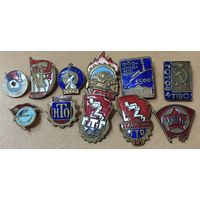 Лот -  11 советских значков в тяжелом металле.