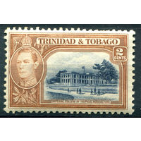 Британские колонии - Тринидад и Тобаго - 1938/44г. - ландшафты, архитектура, король Георг VI, 2 с - 1 марка - MNH, есть жёлтые пятнышки на перфорации [Mi 131]. #4-B5-136-A-1