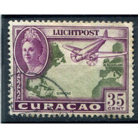 Нидерландские колонии - Кюрасао - 1942г. - ландшафты, авиация, королева Вильгельмина, авиапочта, 35 с - 1 марка - гашёная [Mi 188]. #3-WB-73-A-1