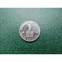 1 шиллинг Кения.